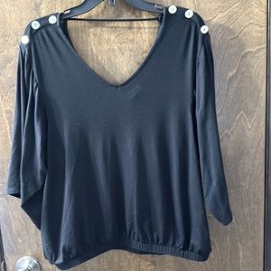 Black V-neck top, size Medium, Ragland sleeves is nice to add to any wardrobe.